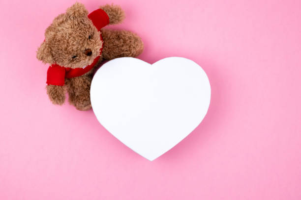 istock Teddy bear, white box hearts shaped, Valentines Day gift. Present for the christmas, thanks giving day, birthday holiday. 1162460426