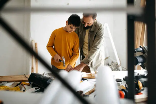 Father and son renovating together