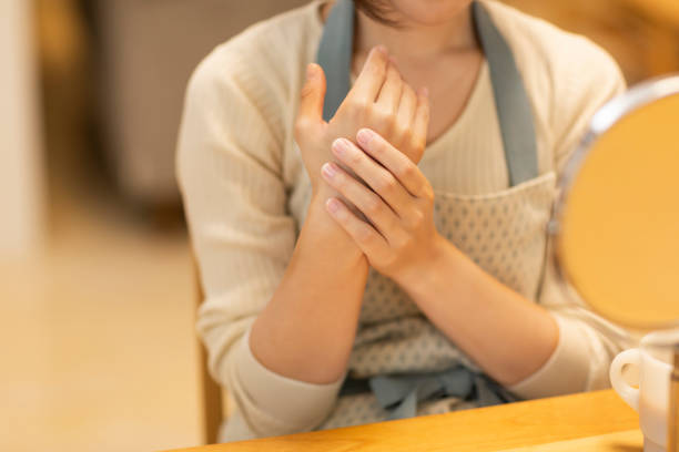 istock Woman applying hand cream to hand 1162461375