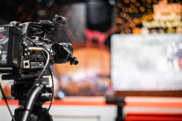 istock Video camera taking live video streaming with people working background at meeting room. Selective focus 1162463868