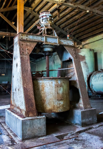 istock Old Rusted Machinery in Abandoned Cannery Warehouse Building 1162470794