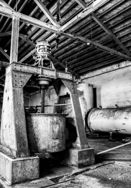 istock Black and White Old Machinery in Abandoned Industrial Building 1162470823