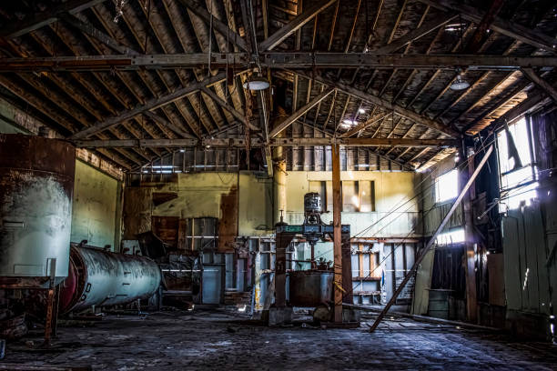 istock Rustic Decaying Interior of Abandoned Cannery Warehouse Building 1162470853