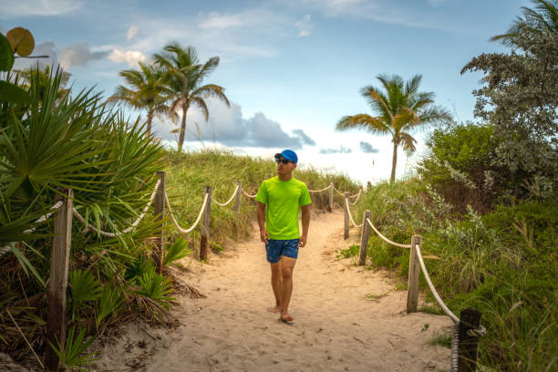 istock Teen on a footpath in Miami Beach 1162470882