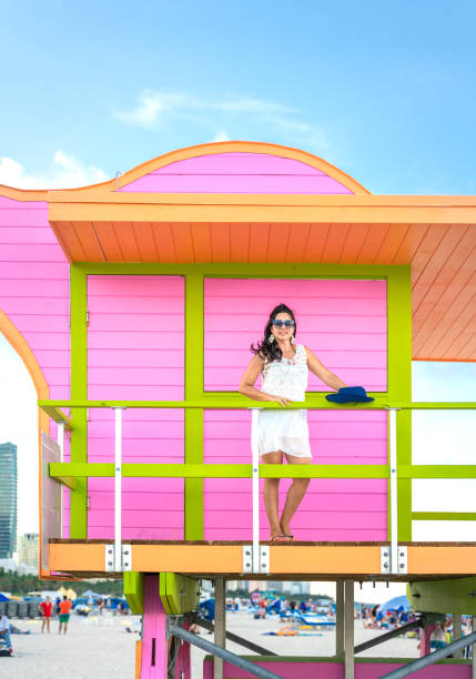 Woman at a lifeguard hut in Miami Beach