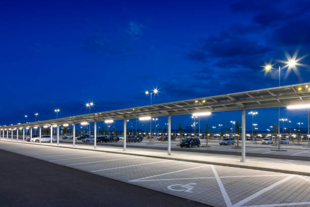 istock modern parking with covered pedestrian corridor at night 1162476376