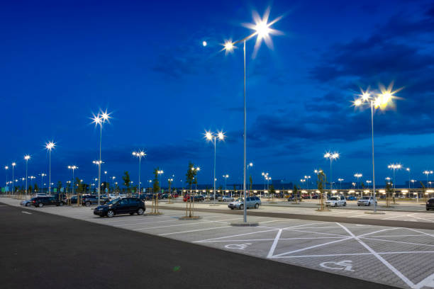 big modern empty parking lot at night - street light parking lot night lot imagens e fotografias de stock