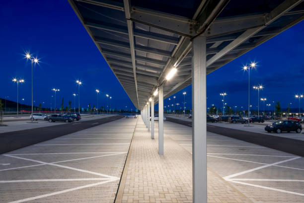 istock covered corridor for pedestrian in a modern parking lot at night with bright illumination 1162477801