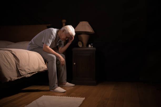 istock A depressed senior person sitting in bed cannot sleep from insomnia 1162477940