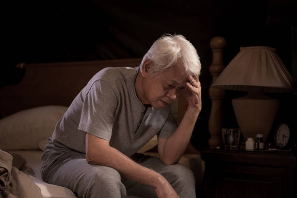istock A depressed senior person sitting in bed cannot sleep from insomnia 1162477971
