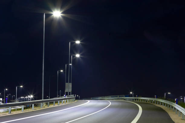 istock night empty road with modern LED street lights 1162478062
