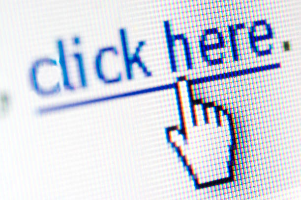 Browsing the Web Mouse over a link on computer screen click link stock pictures, royalty-free photos & images