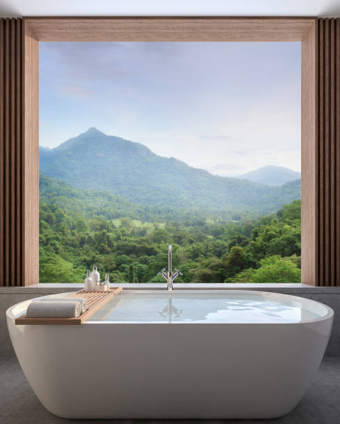 Modern contemporary bathroom with nature view 3d render Modern contemporary bathroom with nature view 3d render,There are concrete tile floor decorate wall with wood lattice, There are large open window overlooking to see mountain view. hotel window view stock pictures, royalty-free photos & images