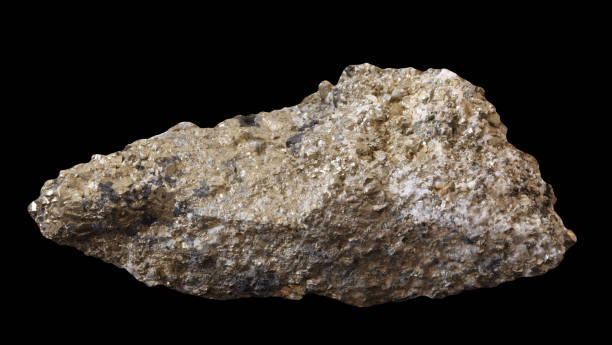 istock Raw Pyrite mineral with impurity on black background 1162486283
