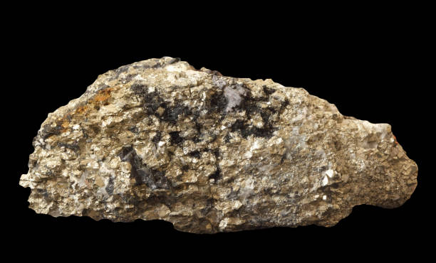 istock Pyrite mineral with impurity on black background 1162486289