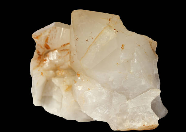 istock Natural Calcite  crystal with  more white and red  tones on a black background 1162486396