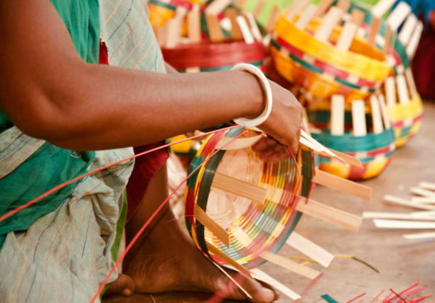 istock Woman working with bamboo objects unique photo 1162486460