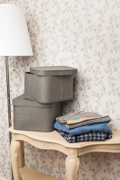 istock Box with folded things in the interior of the apartment 1162496436