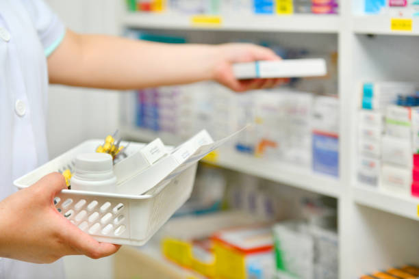 istock Pharmacist filling prescription in pharmacy 1162497686