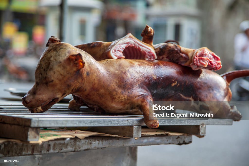Dog meat sale in a street market in Vietnam. Selling Stock Photo