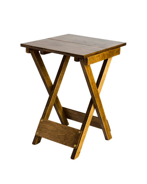 istock Dark wooden folding stool isolated on white background 1162500236