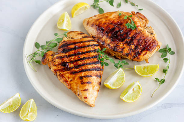 istock Grilled healthy chicken breasts in a White Plate 1162502667