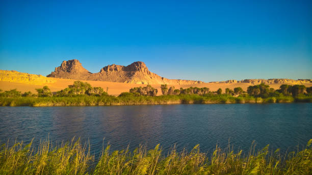 Panoramic view to Boukkou lake group of Ounianga Serir lakes at the Ennedi, Chad Panoramic view to Boukkou lake group of Ounianga Serir lakes at sunrise , Ennedi, Chad lakes of ounianga photos stock pictures, royalty-free photos & images