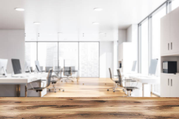 istock White open space office interior meeting room blur 1162506393