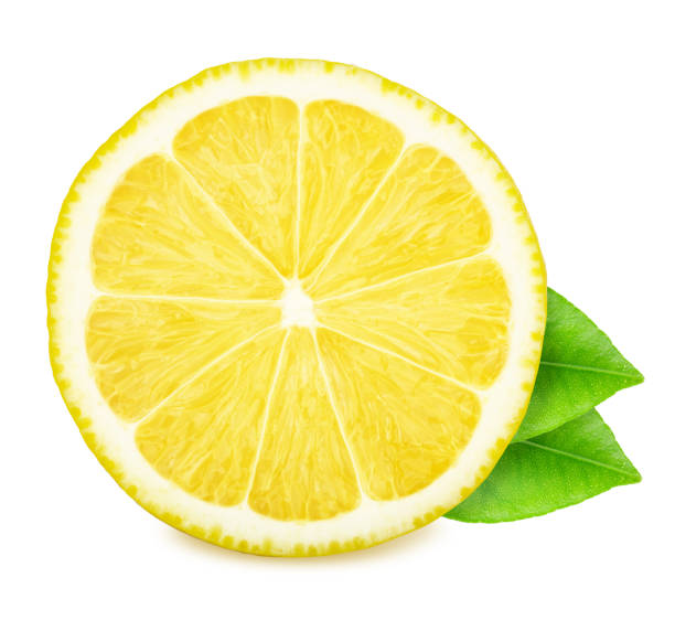 istock Half of lemon with leaves isolated on white background. 1162507053