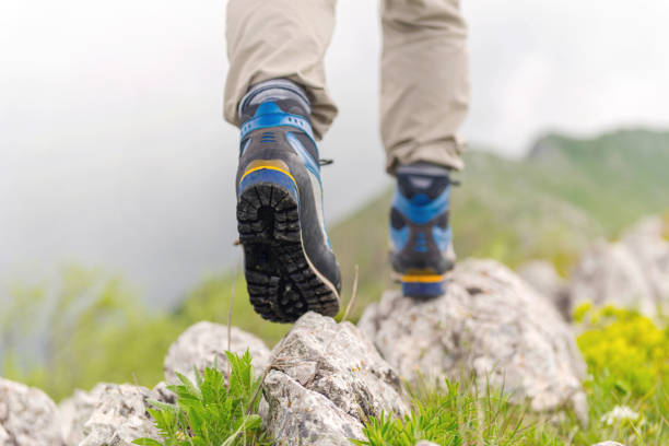 istock Hiker walks on Mountain Trail 1162507118