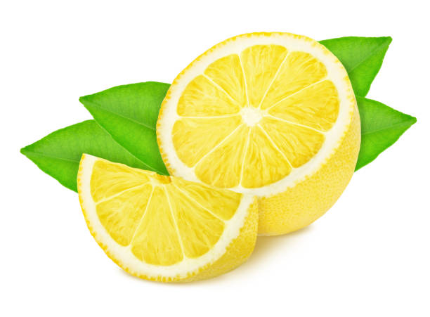 istock Half and slice of lemon with leaves isolated on white background. 1162507283
