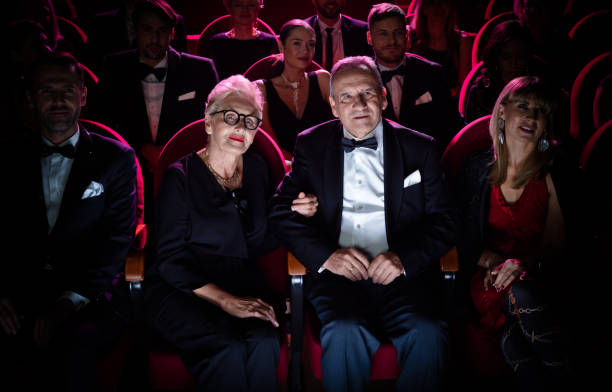 istock Senior couple watching theatrical performance 1162510426