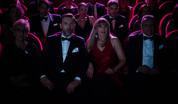 istock Shocked mature couple watching opera in theater 1162510556