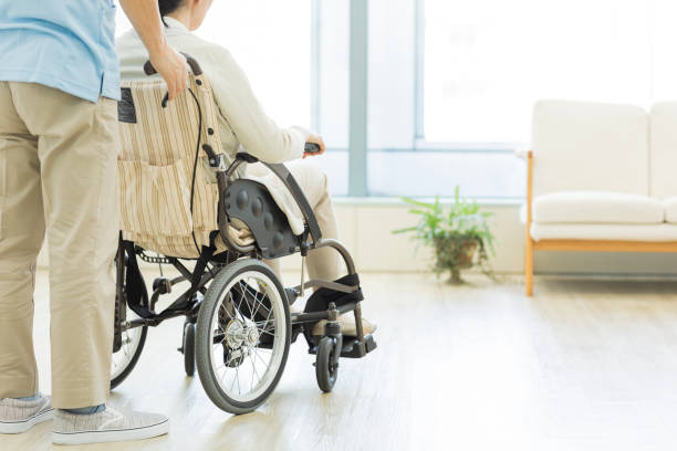 Senior woman and carer stock photo