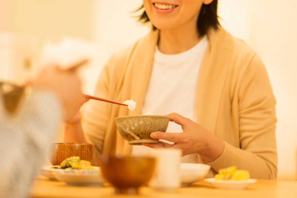istock Senior couple eating rice 1162510622