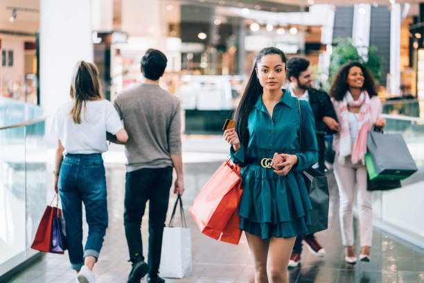 istock Woman in the shopping mall 1162511279