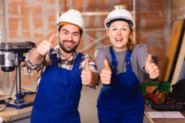 istock Two professional builders with thumbs up 1162513798
