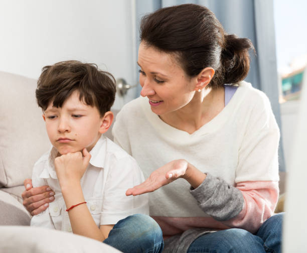 istock Mother soothing upset boy 1162514655