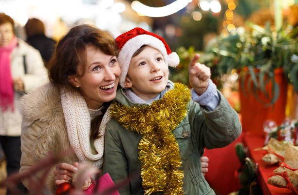 istock Happy family on Christmas fair 1162514826