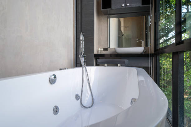 istock Luxury bathroom features bathtub with flower 1162515442