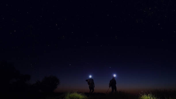 istock Young people trekking at night 1162515817
