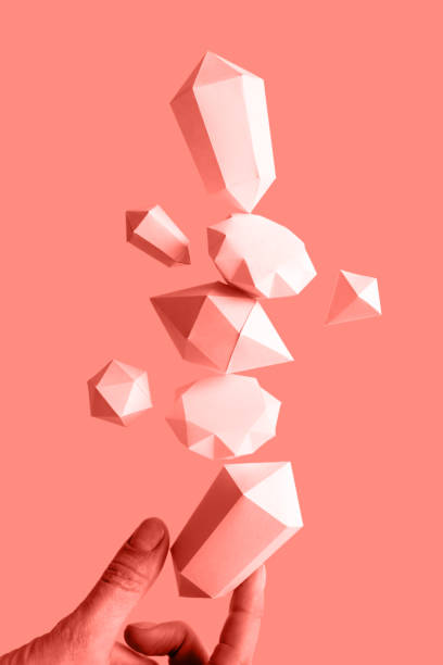 istock polygonal diamonds made of paper on a blue background 1162515858