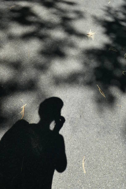 istock my shadow on the road 1162515888