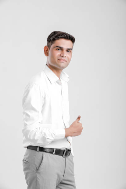 istock Young Indian man wearing suit and showing thumbs up 1162518326