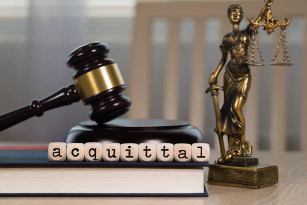 istock Word  ACQUITTAL composed of wooden dices. 1162518492