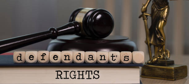 istock Words DEFENDANT'S RIGHTS composed of wooden dices. 1162518605