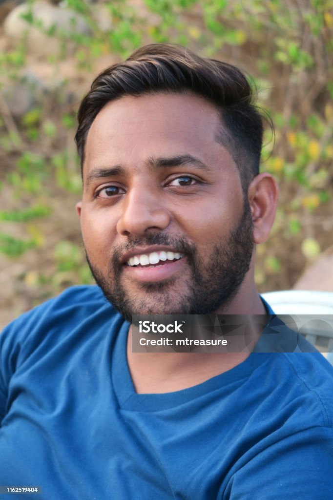 Image Of Happy Smiling Handsome Indian Man With Pale Skin And Short Trendy  Hairstyle Parted With Blonde Highlights And Shaved Sides Good Looking Hindu  Man In 20s With Trimmed Beard And Perfect