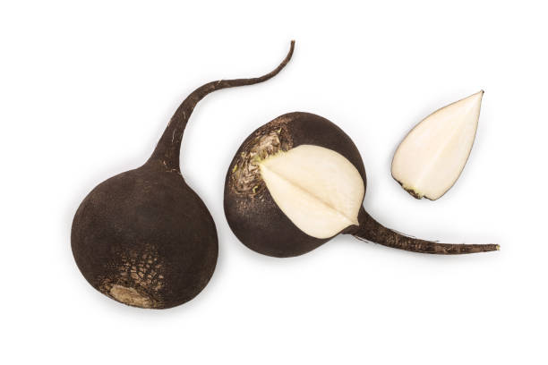 istock Black radish with slices isolated on white background. Top view. Flat lay 1162521494