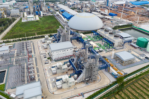 Aerial view electric power plant substation, Export-oriented manufacturing paper packaging and corrugated industry