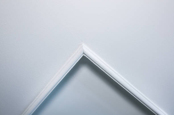 istock Baseboard on the corner. Renovation works indoors. Whitewash walls. 1162525877